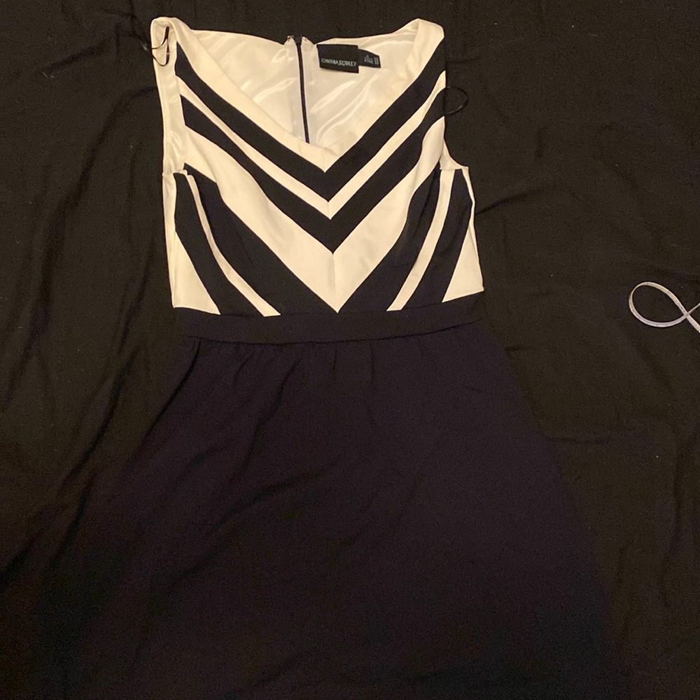 Half black skirt and white/Black top flare out dress